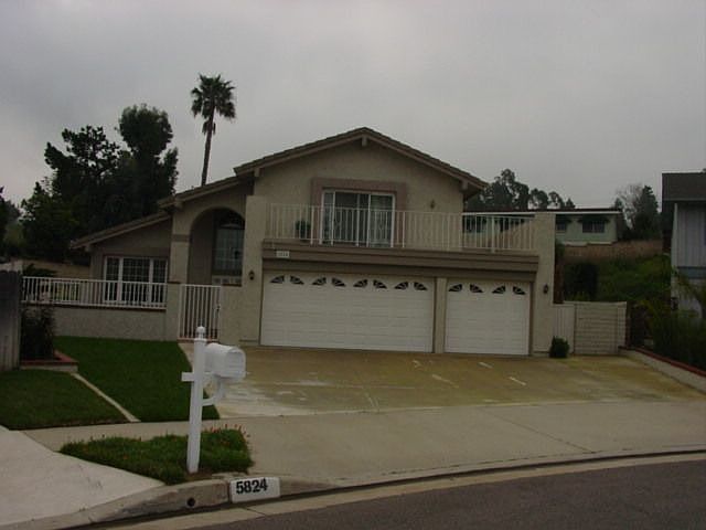 Huge Driveway and three car garage