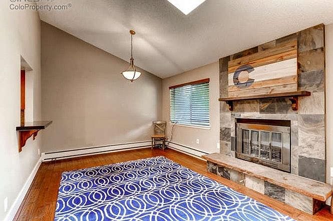 Living Room with Slate Tile, Wood-Burning Fireplace