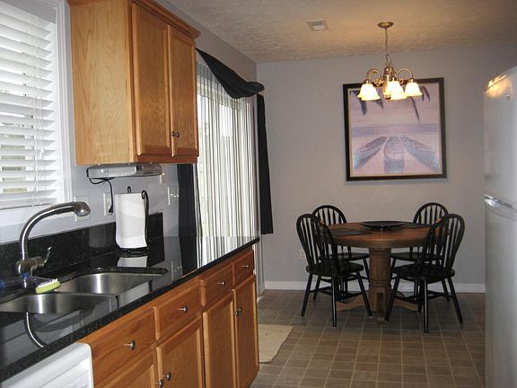 Granite counter-tops in kitchen and baths
