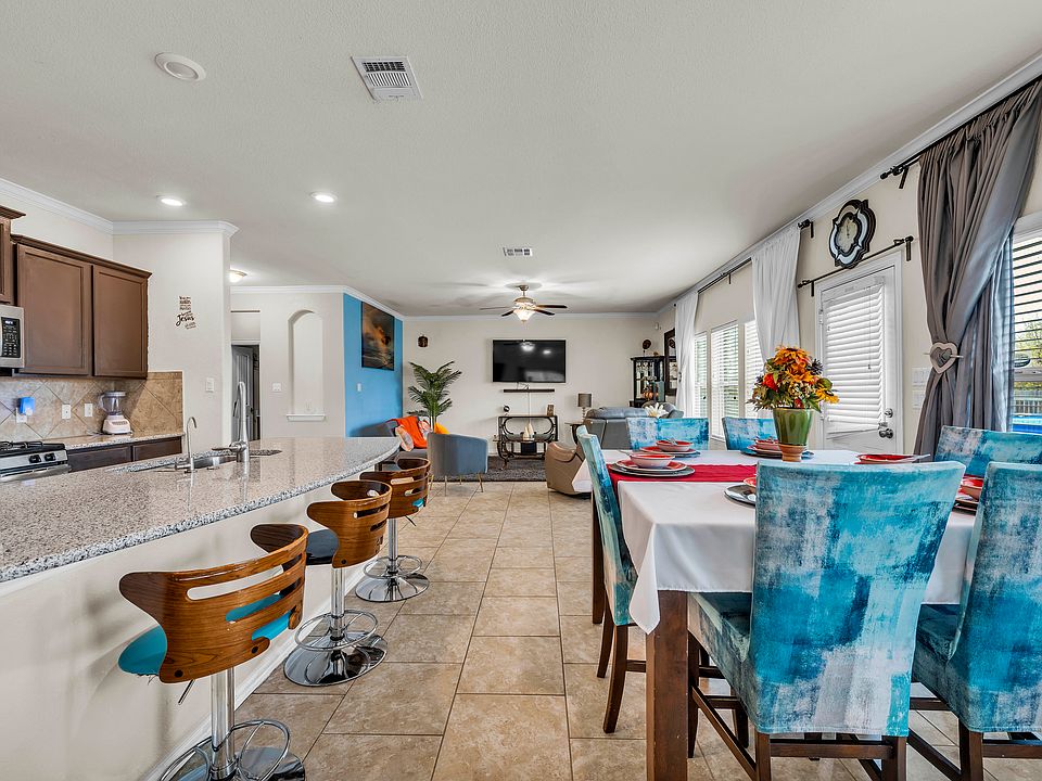 An open-space living room filled with plenty of natural light.