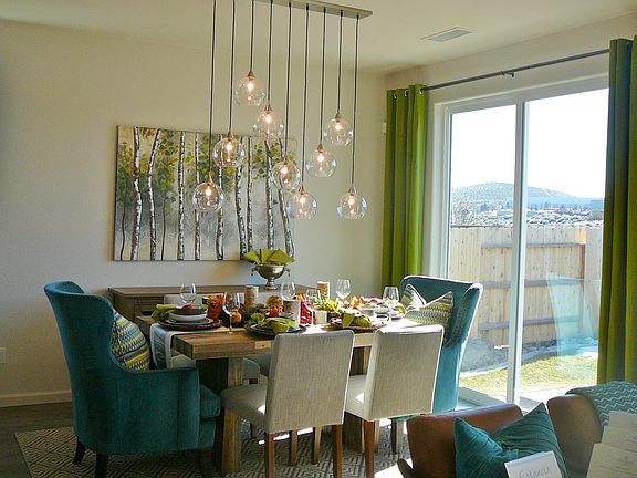 Open floor plan with slider to backyard