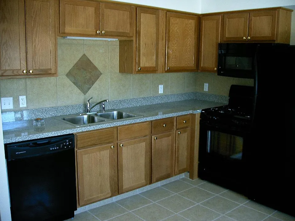 Modern black appliances in Kitchen