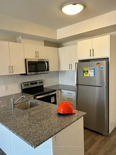 103 Roger St N #303 Photo 1