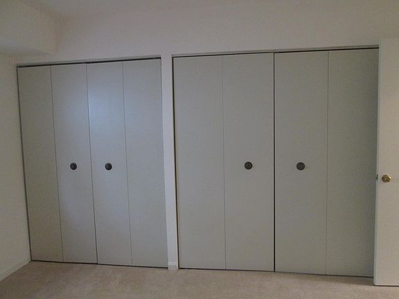 Master bedroom his and her closets