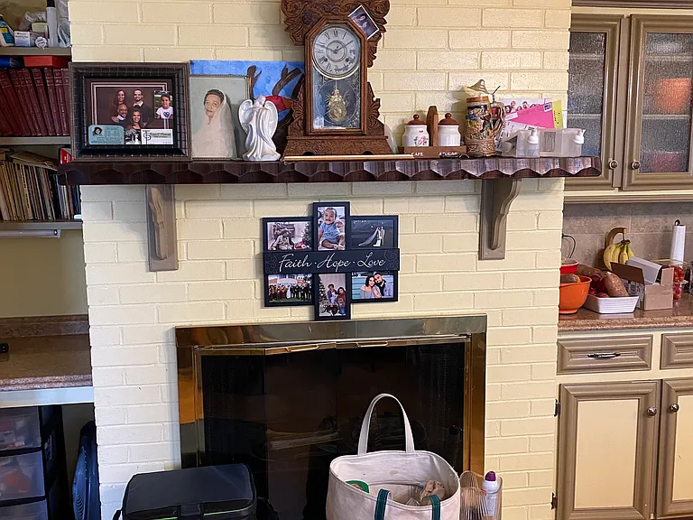 Fireplace (not functional) in breakfast area