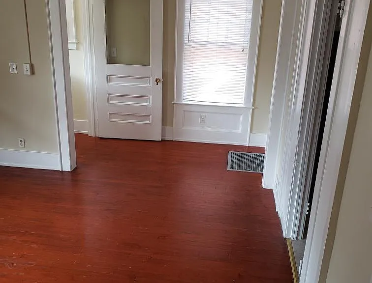 View of entryway from LR; kitchen on right