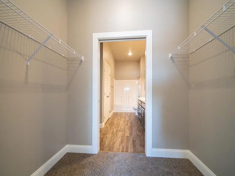 The Aspire: Closet into Bathroom