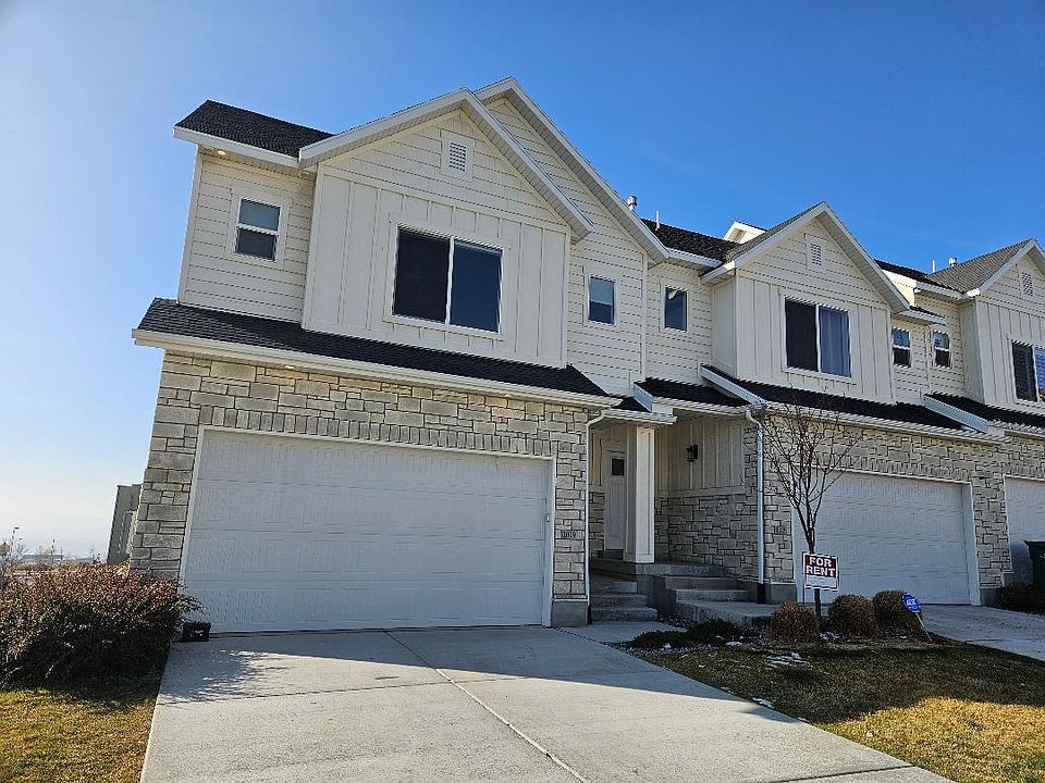 Front of townhome ,second from end with rental sign in front