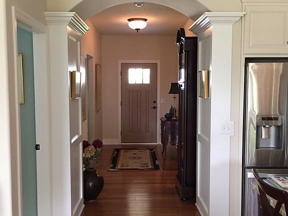 Foyer with arched opening