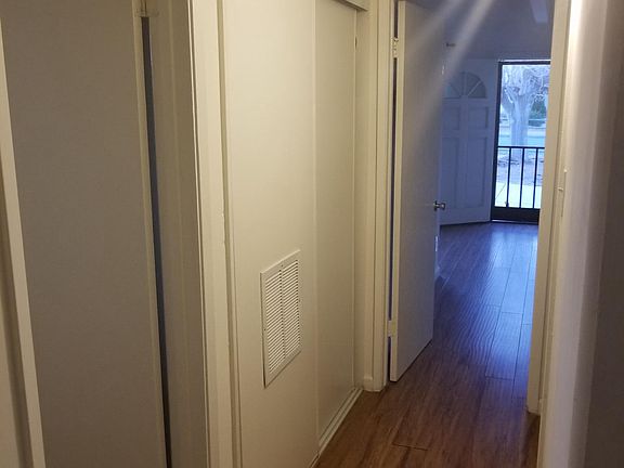Hallway with hallway closet
