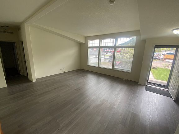 Living Room with vaulted ceilings, LVP flooring.