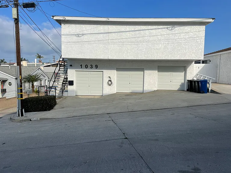 Tesla charger in left (west) garage.