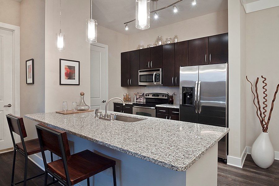 Beautiful interiors with soaring 10' ceilings, wide-plank flooring and open floor plans