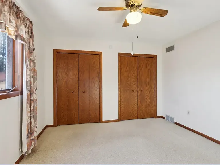Master bedroom. Curtains have been removed.