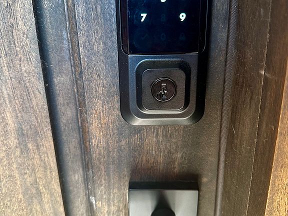 Upgraded entry. Added security. Electronic coded keyless entry. Manual key also included as backup.