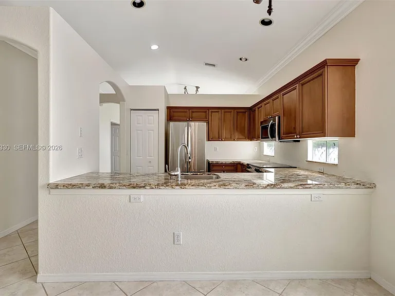 8481 Siciliano St — Photo 12
