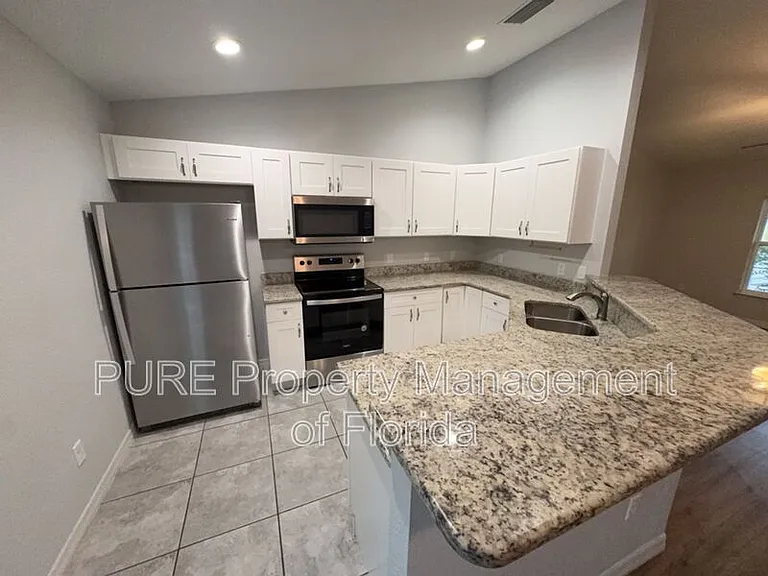 9870 SE 159th St — Photo 16
