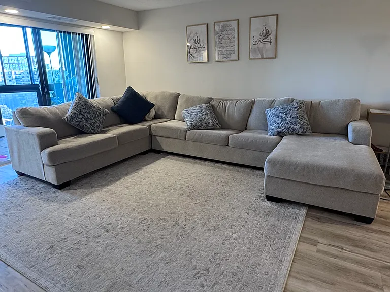 This is the newer, larger, more comfortable sofa (no longer the black sofa in other pics which prior renter used)