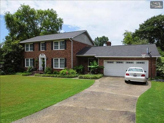 Two-car garage has an automatic door