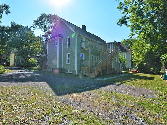 Large parking lot and back yard