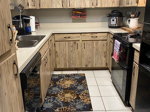 Galley kitchen from DR with SE exposure