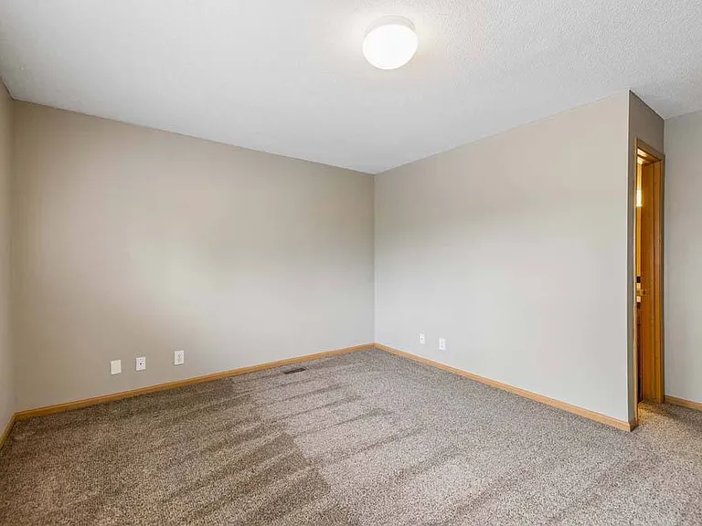 A versatile bedroom with a bright, open feel provides the perfect space to relax, recharge, and make your own.
