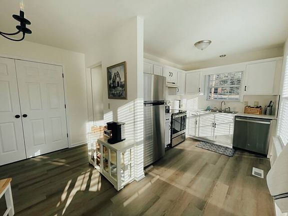 Kitchen and coffee station. Included washer and dryer behind doors on left side of picture.