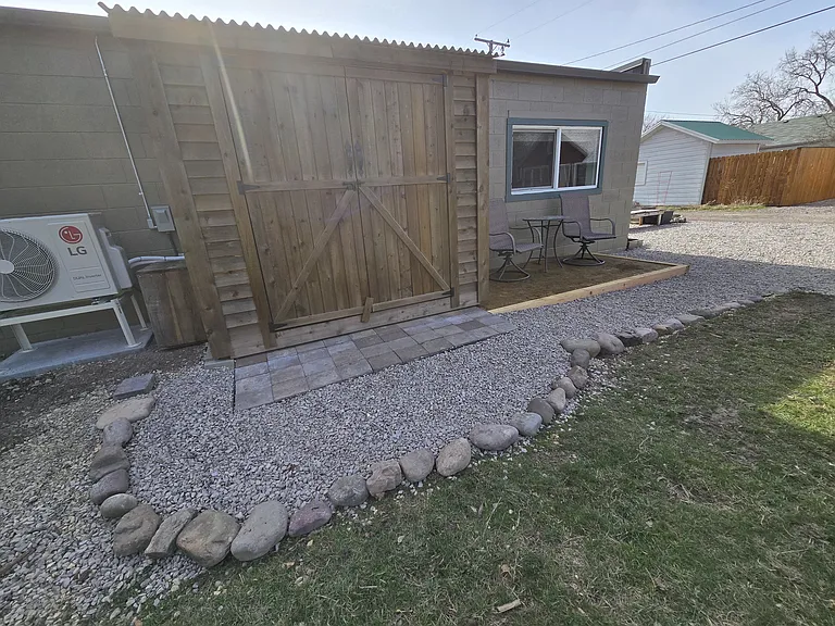 Brand new cedar shed, with mini split to the left.