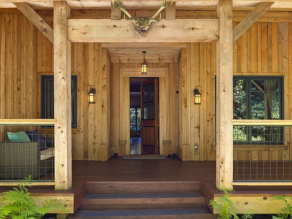 With style that's reminiscent of a mountain lodge, the front porch and entry offer a welcome you won't find elsewhere on the island.