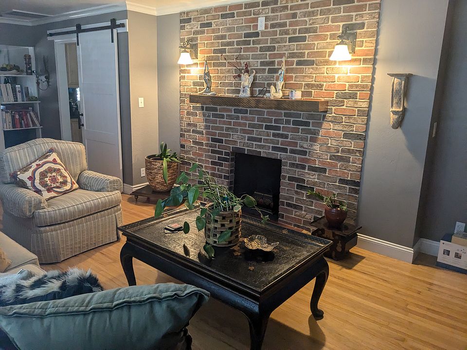 View of formal living room near front door entrance.