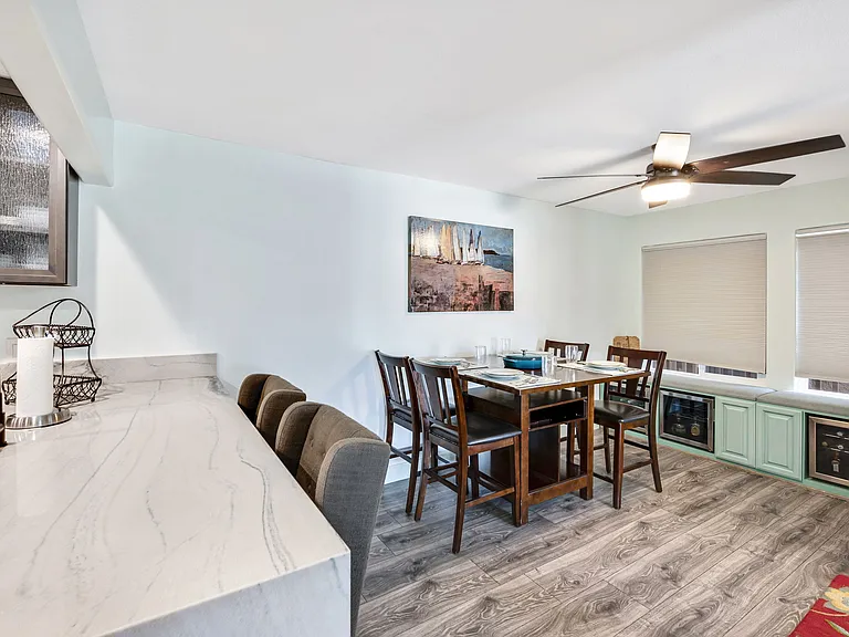 Dining room and bar stools in kitchen