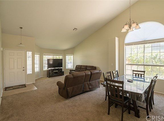 Front entrance with huge window and a lot of natural lighting.