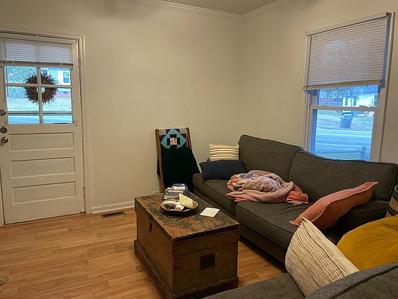 Another view of living room-include front entrance.