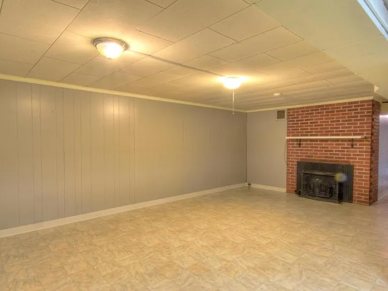 Giant bonus rooms downstairs- could be second living room, man cave, play room...