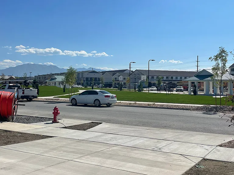 Full size driveway with parks and amenities right across the street.