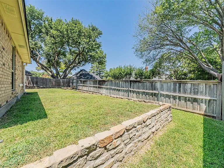 ANOTHER VIEW OF THE YARD