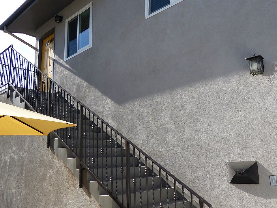 Staircase to the upstairs apartment.