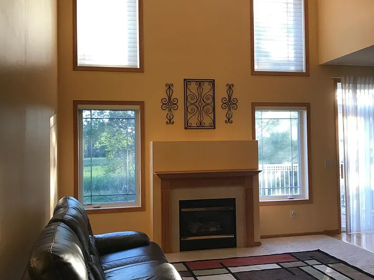 Main Level Living Room with tall ceiling and south facing with lot of sunlight