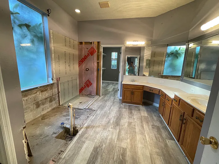 Upgrade started. Master bath with 2 level counters and makeup vanity; needs shower finished Add slipper tub or dream of possibilities. Access to primary walk-in closet
