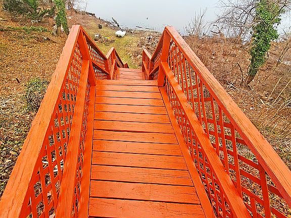 Newly stained steps to lake