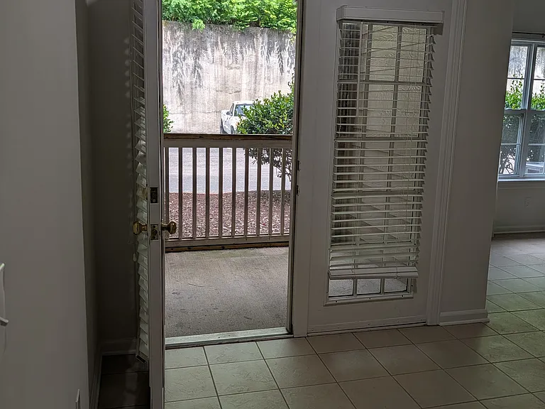 This screened in porch is coming off the main living room.