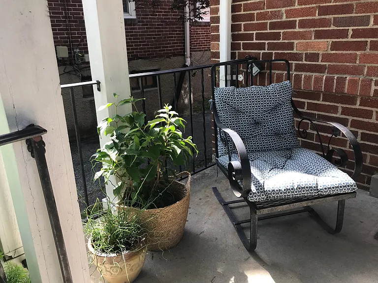 Covered front door with small porch, you are able to sit here whenever you like
