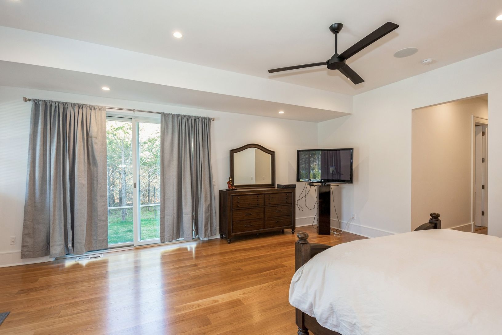  One of two real primary Bedrooms is  on main floor with a beautiful en suite bath.