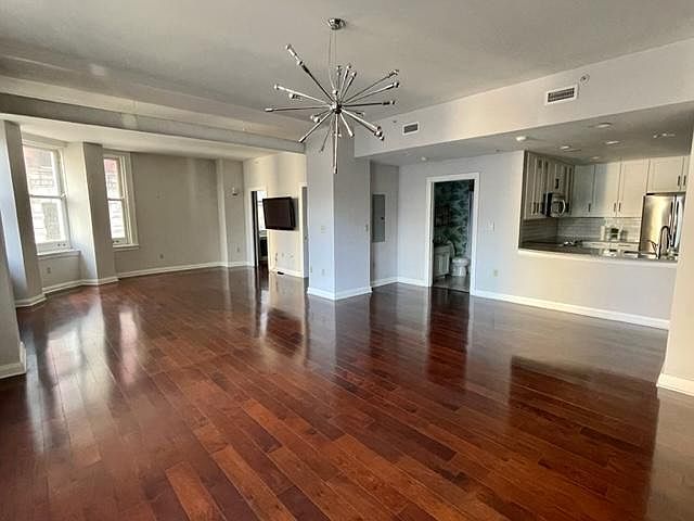 Without furniture: very spacious, open floor plan!