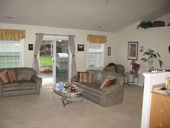 Open floor plan with vaulted ceilings