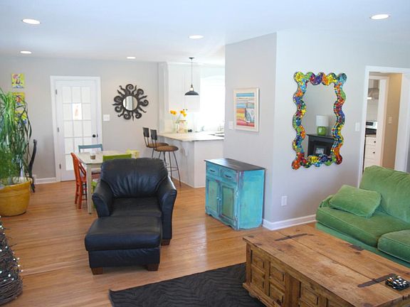 Open concept living room/dining/kitchen. Bright and beautiful