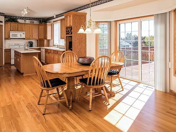 Bright and clean with an abundance of natural light.  Beautiful hardwood floors, plenty of space for family gatherings with access to the deck and backyard