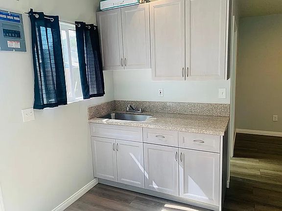Kitchen Cabinets and 2 burner hot plate