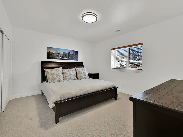 Downstairs bedroom with queen sized bed
