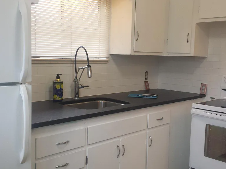 Granite countertops, new subway tile backsplash and updated